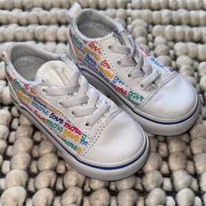 Vans Kids White Sneakers with Colorful Text Accents
